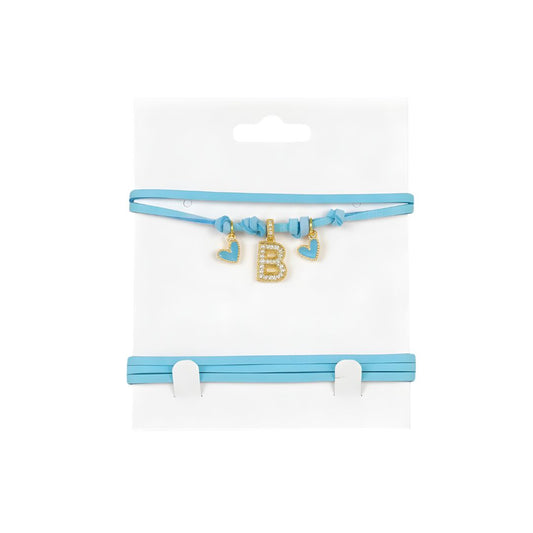 Choker azzurro in pelle scamosciata con lettera B e cuoricini azzurri e dorati