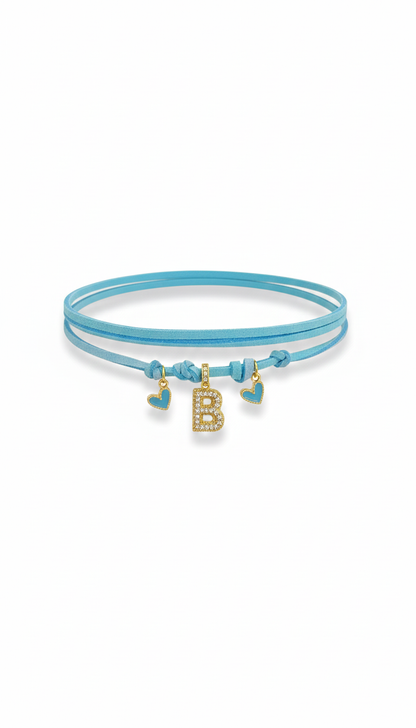 Choker azzurro in pelle scamosciata con lettera B e cuoricini azzurri e dorati