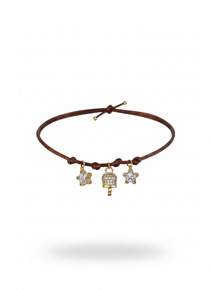 Choker marrone con stelline gold glitter e campanellino zirconato